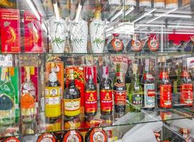 Bangkok Thailand 22. May 2018 Chinese and Thai liquor display window China Town Bangkok Thailand. photo