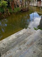 courtyards and gardens that were submerged in water due to overnight flooding. photo