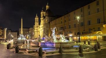 Piazza Navona, in Rome, Italy, with the famous Bernini fountain by night. photo