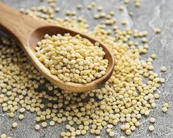 Raw Couscous on a table photo