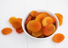 Dried apricots on a table photo