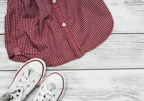 Checkered shirt with white sneakers photo