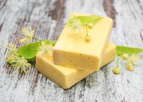 Handmade soap and linden flowers photo