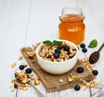 Homemade granola with blueberries photo