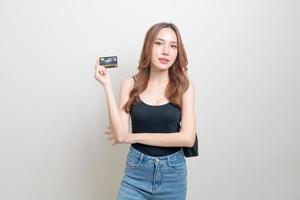 portrait beautiful Asian woman holding credit card photo