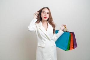 portrait beautiful Asian woman holding shopping bag