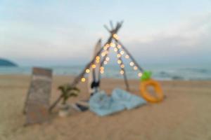 abstract blur camping yard on beach for background photo