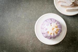 taro bun with white sugar cream and nut photo