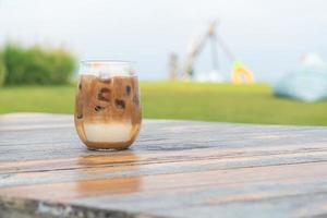 iced latte coffee glass on table photo