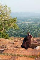 Buddhist monk at Sigiriya mountain, Sri Lanka photo