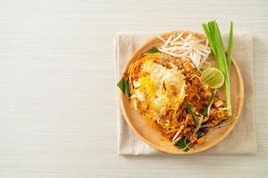 Pad Thai - stir fried noodles in Thai style with egg photo