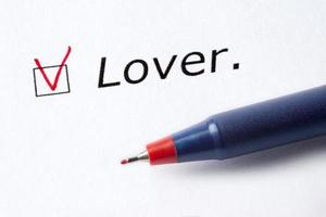 The word lover is printed on a white background. photo