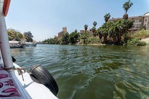 slum houses of Cairo on the banks of the Nile in Egypt photo