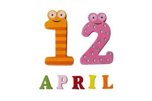 April 12 on a white background of numbers and letters.