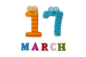 March 17 on white background, numbers and letters. photo