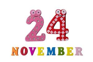 November 24 on white background, numbers and letters. photo