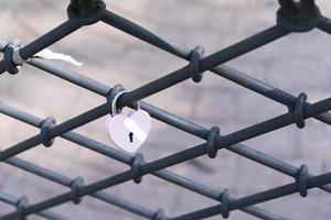 Heart shaped love lock-beautiful wedding day custom. photo