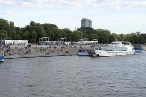 People on the waterfront near the Moscow river. photo