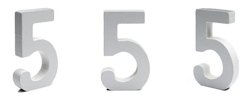 Figure five made of plaster on a white background at different angles. photo