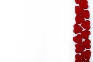 Red hearts on a white background. photo