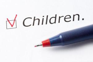 The word children is printed on a white background. photo