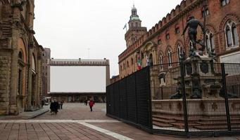 Blank mock up of street advertising billboard in Bologna, Italy, by day. Outdoor poster for advertising concept photo