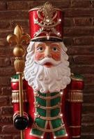 Outdoor Santa Claus statue decoration in Bologna. Italy. photo