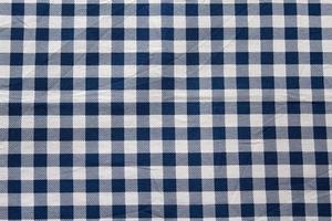 Checkered tablecloth texture top view selective focus photo