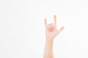 Man hand sign isolated on white background. Drive concept. Rock gesture, copy space. photo