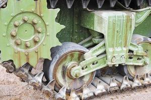 Tank caterpillar tread with wheels.