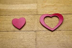 Heart on the wooden floor. photo