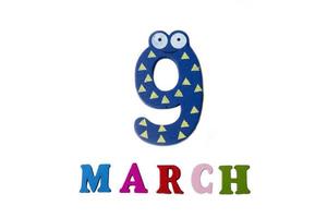 March 9 on white background, numbers and letters. photo