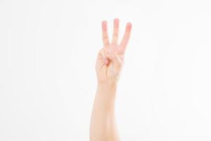 hand show the third, number three sign. isolated on white background. caucasian arm. Mock up. Copy space. Template. Blank. photo