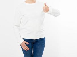beautiful woman in white pullover posing and show like on white background - mock up cropped image photo