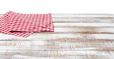 chekered tablecloth on empty table isolated on white background copy space photo