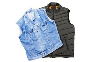 set Blue Denim Vest and Bologna Green Vest isolated on white background top view photo