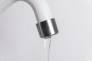 White kitchen sink faucet  - Close up
