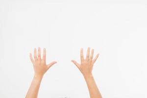 Two close woman hands isolated on white background. Copy space. photo