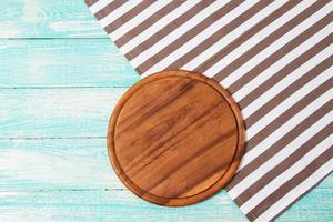empty desk,tablecloth on wooden table top view,copy space,food and drink concept photo