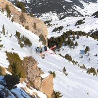 Young skier doing a turn in the Mountains of Andorra in Grandvalira, Andorra. photo