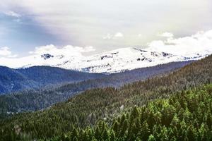 View of the mountain valley with rocks, forests and meadows The best place for active life, climbing, hiking photo