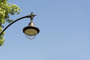 Lamp post in the sky. photo