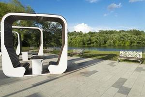 Wooden benches with a roof in the open air. photo