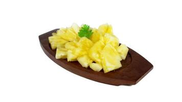 pineapple sliced serve on the wooden dish, closeup photoshoot photo