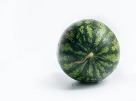 Whole ripe watermelon isolate on the white background. photo