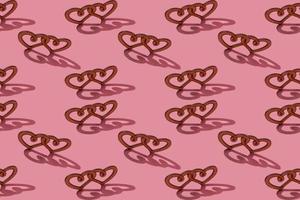 Wooden heart with hard shadow on a pink background. Trendy background for valentine's day. pattern photo