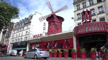 Cabaret Moulin Rouge in Daytime on Boulevard de Clichy in Paris video
