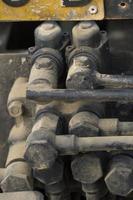 Rusty bolts and nuts of pipeline photo