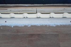 Architectural elements of the building covered with snow photo