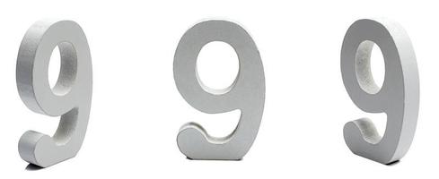 The number nine on a white background at different angles. photo